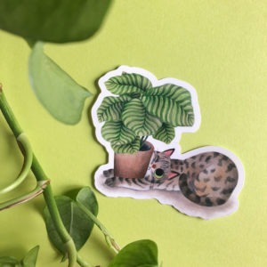Pegatina de una ilustración de Mar Villar de un gato con una planta
