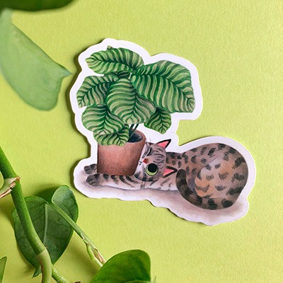 Pegatina de una ilustración de Mar Villar de un gato con una planta